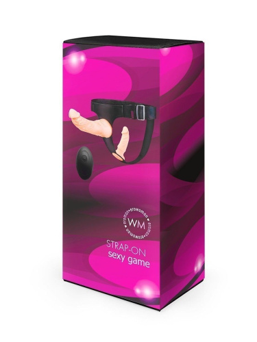 Женский страпон с 2 насадками, вибрацией и пультом ДУ фото 4 Женский страпон с 2 насадками, вибрацией и пультом ДУ фото 4