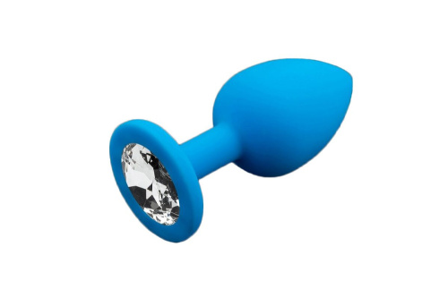 Маленькая голубая силиконовая пробка с прозрачным кристаллом - 7,5 см. Маленькая голубая силиконовая пробка с прозрачным кристаллом - 7,5 см.