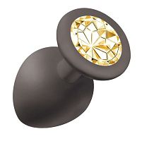 Чёрная анальная пробка Emotions Cutie Large с желтым кристаллом - 10 см.