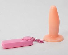 Телесная анальная пробка с вибрацией и ограничительным основанием - 12 см.
