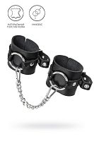 Черные наручники из толстой натуральной кожи с люверсами