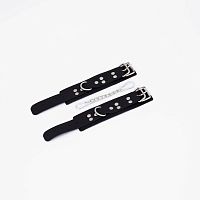 Черные кожаные наручники с регулируемыми ремешками