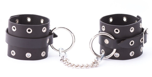Черные кожаные оковы с люверсами Черные кожаные оковы с люверсами
