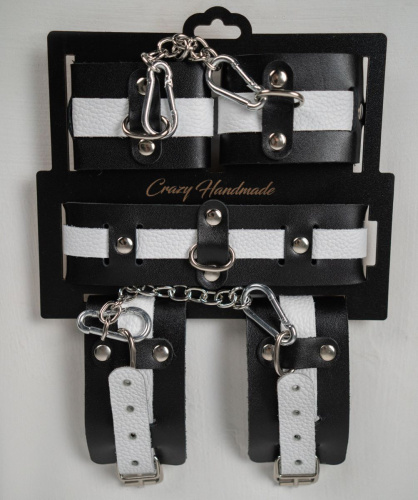 Набор фиксаторов из черной и белой натуральной кожи Набор фиксаторов из черной и белой натуральной кожи