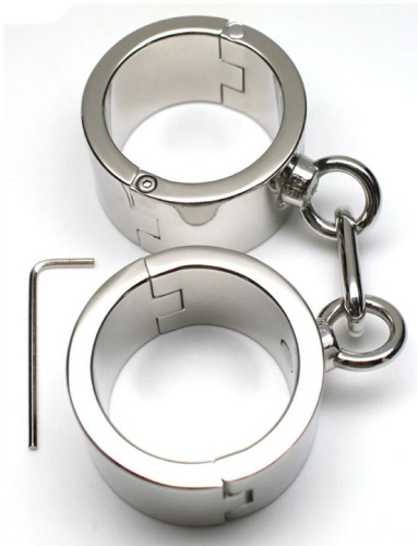 Серебристые металлические гладкие наручники фото 3