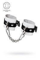 Бело-черные кожаные наручники с одним ремешком с люверсами