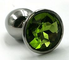 Серебристая маленькая анальная пробка с зеленым кристаллом - 6 см.