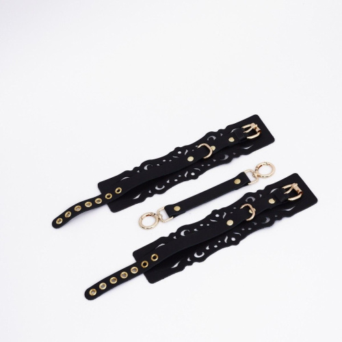 Черный кожаные оковы с узорами и золотистой фурнитурой Черный кожаные оковы с узорами и золотистой фурнитурой