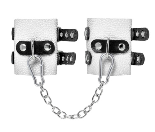 Бело-черные наручники с двумя ремешками и люверсами Бело-черные наручники с двумя ремешками и люверсами